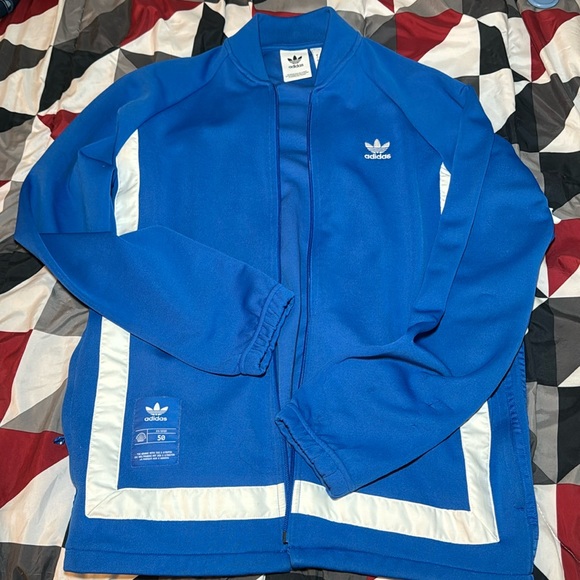 Adidas blue jacket with adidas logo 🔥 - Picture 1 of 4